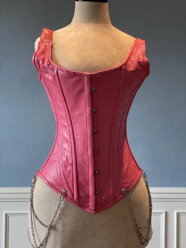 Bustiers and corsets for figure enhancement-Salmon color leather corset vest with shoulder straps and chains. Steel-boned corset top for tight lacing. Bustiers and corsets for figure enhancement-Salmon color leather corset vest with shoulder straps and chains. Steel-boned corset top for tight lacing.