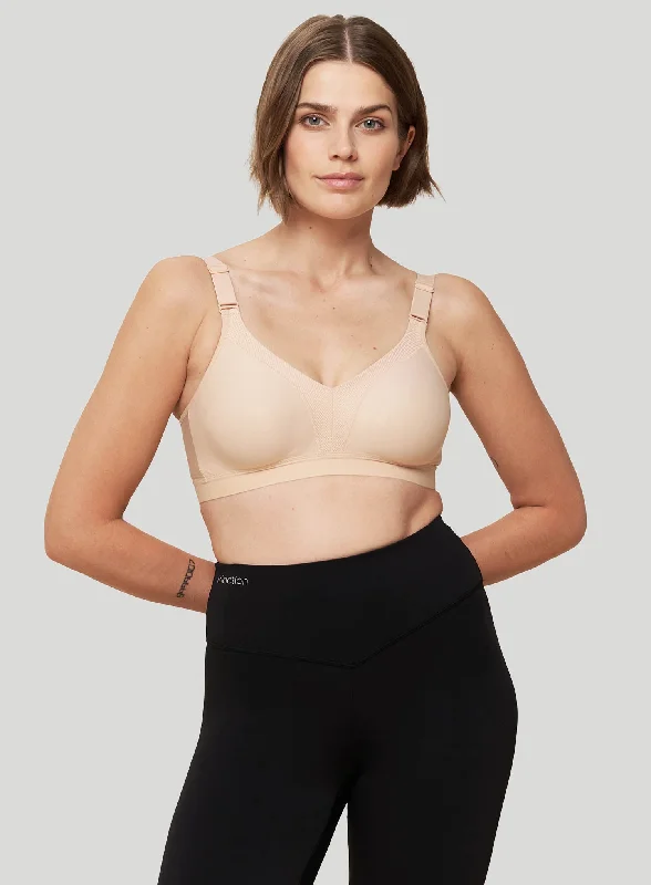 No-show sports bras for smooth fit-Triumph: Triaction Wellness N Neutral Beige